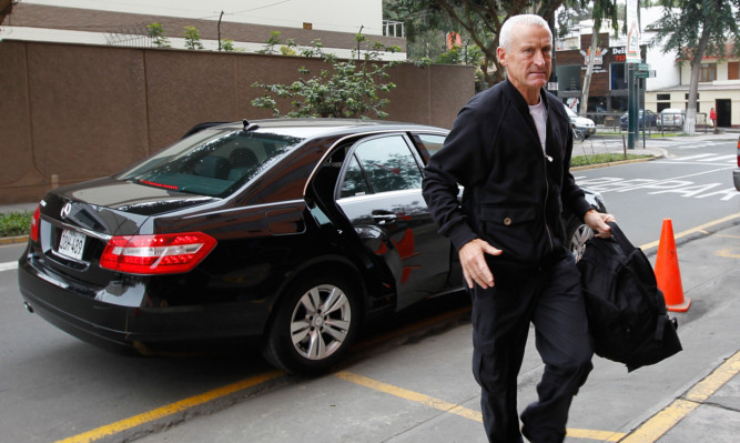 William Reid arrives to the National Police anti-drug headquarters in Lima.