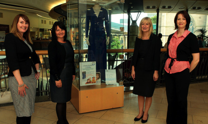 From left; Jennifer Brand, Susan Dow, Lesley campbell all from Findlay & Co, with Angie Foreman from Cash For Kids.