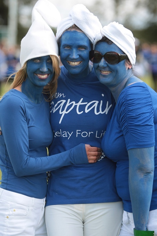 Kim Cessford, Courier 13.08.11 - the Kirriemuir Race for Life event started at the venue, East Muirhead of Logie, Kirriemuir - pictured are some of the team of Smurfs who took part l to r - Amanda and Auidrey Ireland and Nikki Bryce