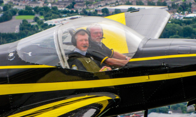 Willie Rennie takes part in a training flight with Sky Watch pilot Keith Boardman.