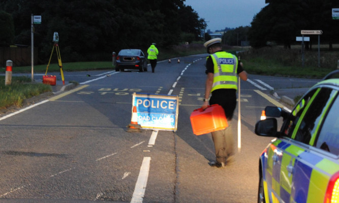 Police near the scene of the accident.