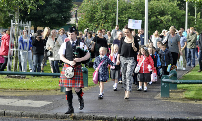 Piper Nick Leck leads the way.