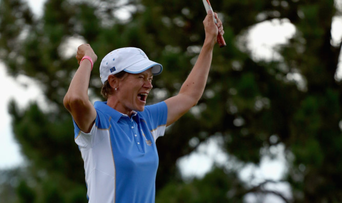 Joy for Catriona Matthew as her putt seals victory for Europe.