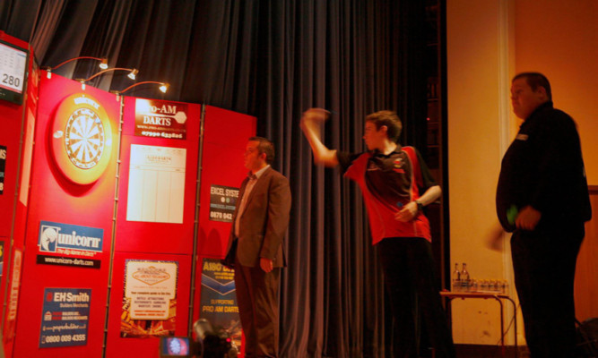 Graeme Hamilton at the oche in the Reid Hall.