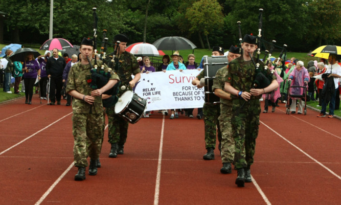 The Angus & Dundee Army Cadets Pipe Band lead the survivors on the first lap.