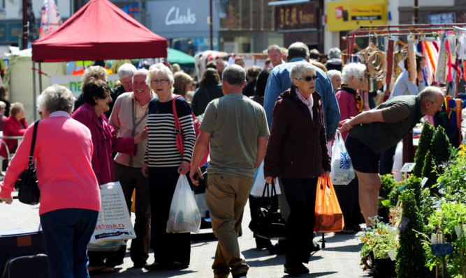 The hot weather undoubtedly supported activity on high streets last month.