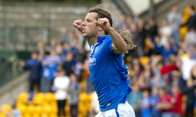 Stevie May celebrates after scoring against Ross County.