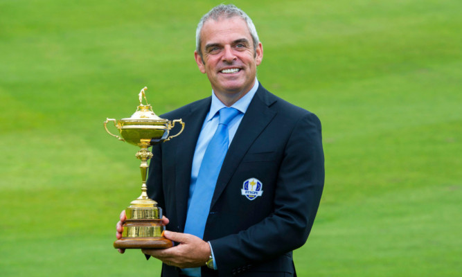European Ryder Cup captain Paul McGinley poses with the trophy at 2014 host course Gleneagles.