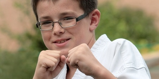 Kim Cessford, Courier 23.08.11 - pictured at home, 5 East Abbey Street, Arbroath is the youngest recipient of a black belt Jack Webster