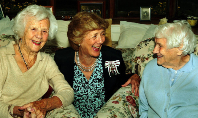 Hilda Jamieson (left) and Nellie Easson are congratulated by Lord Lieutenant of Angus Georgiana Osborne.