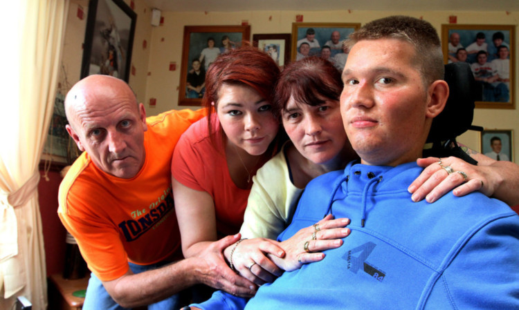 Tragic Daniel, who died in May, with his parents Yvonne and Norman and sister Claire.