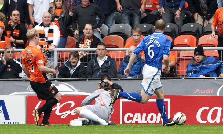 Gary MacKay-Steven grabs United's third goal against St Johnstone on Saturday.