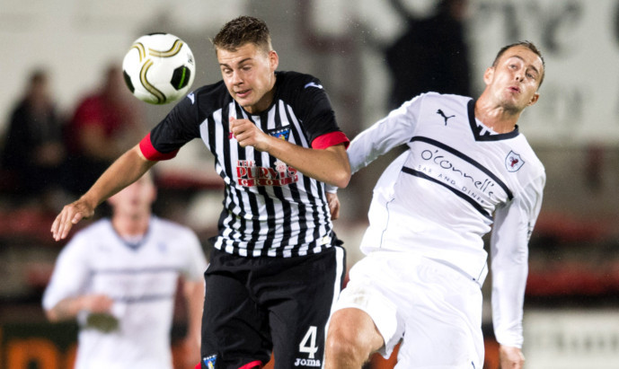 Gordon Smith (right) challenges 
Dunfermline's Kerr Young.