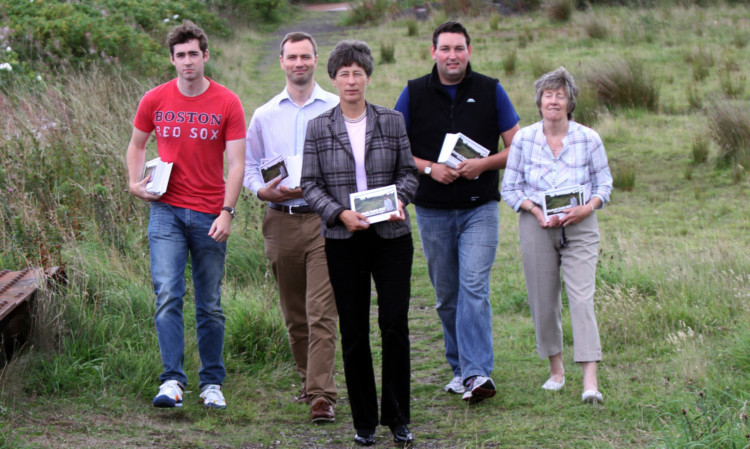 Launching the petition at the site of the old Edinburgh railway line in Kinross were MSP Liz Smith, front, with, from left, Graeme Rose, Douglas Patullo, Liz Smith, Miles Briggs and Councillor Ann Cowan.