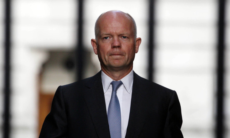 Foreign Secretary William Hague arriving at 10 Downing Street on Tuesday evening for talks on Syria.