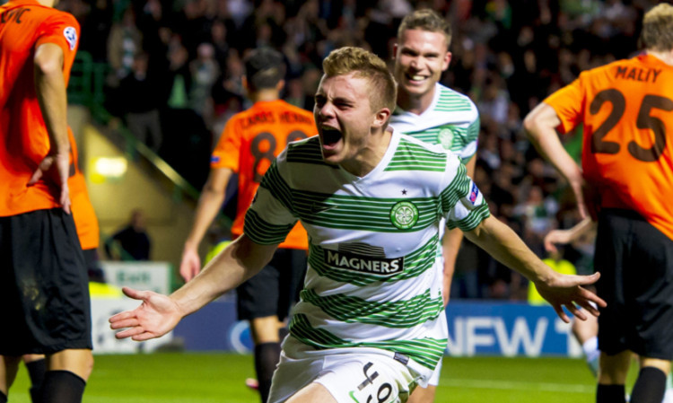 James Forrest celebrates after scoring his side's third goal of the game.