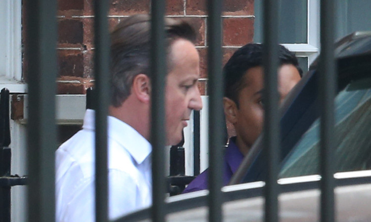 David Cameron leaving Downing Street's back door on Friday.