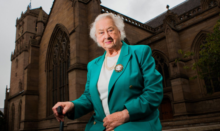 Helen Milne at the site of the steeple memorial at St Marys Parish Church.