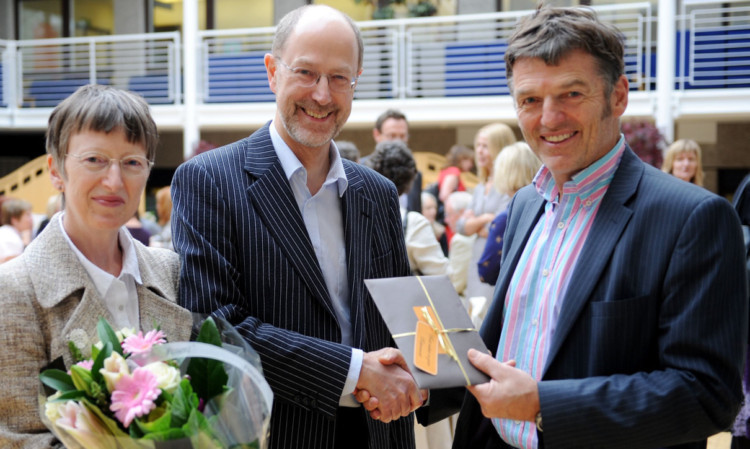 Morag and Paul Ballard with Dr Joe Walker, NHS Tayside director of public health.