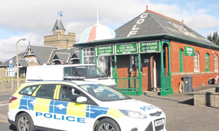 Police at the scene of the break-in.