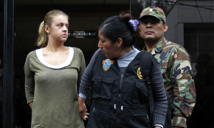 Melissa Reid being taken to court in Lima last month.