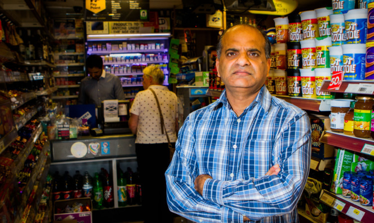 Shop owner Tahir Chandhary was threatened at knifepoint by Bell in the store.