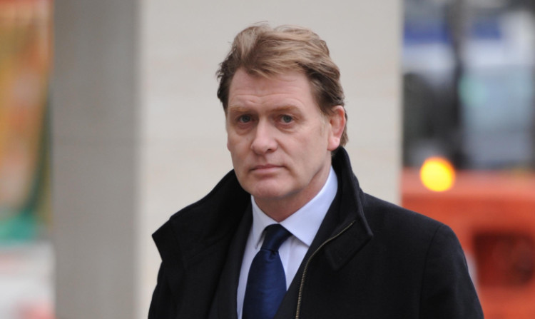 Eric Joyce MP is accused of threatening or abusive behaviour at Edinburgh Airport in May.