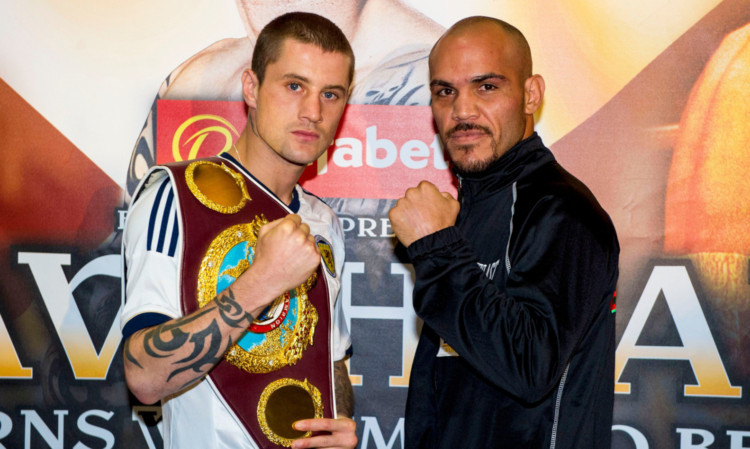 Ricky Burns with Raymundo Beltran.