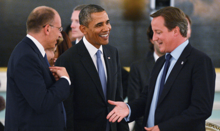 From left; Italian Prime Minister Enrico Letta, U.S. President Barack Obama and British Prime Minister David Cameron talk.