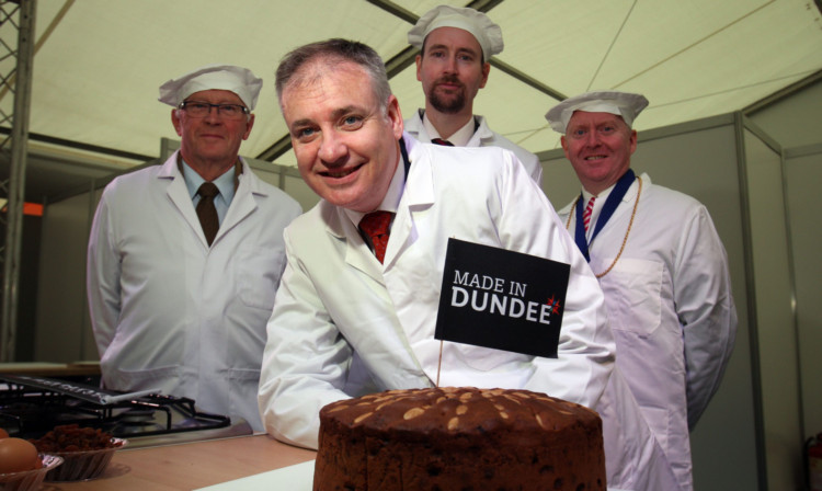 Rural Affairs Secretary Richard Lochhead with Dundee bakers, from left, Alan Clark, Martin Goodfellow and Iain Murray.