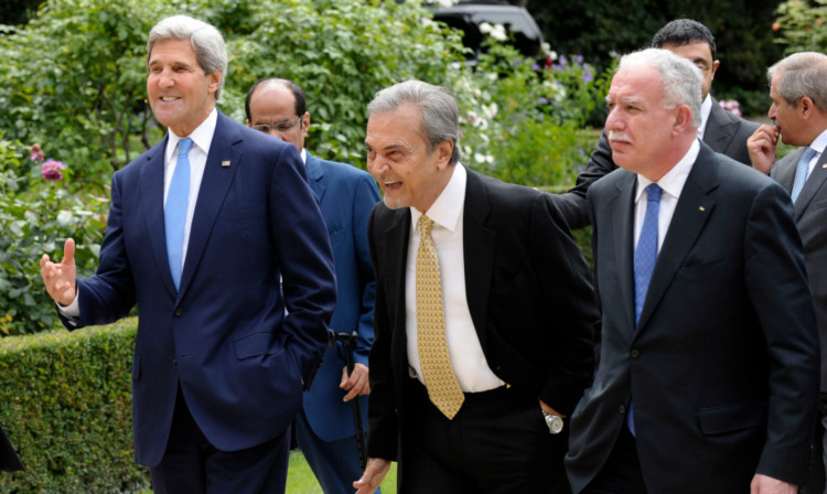 S Secretary of State John Kerry, left, with members of the Arab League Peace Initiative, Saudi Foreign Minister Saud al Faisal, centre, and Palestinian Authority Foreign Minister Riyad al Malki.