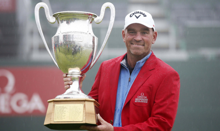 Thomas Bjorn with the Omega European Masters trophy, won after a play-off with Scot Craig Lee.