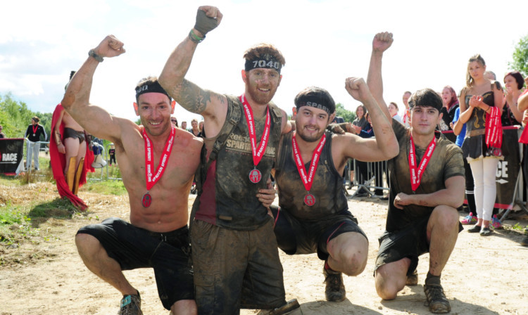 Lance Bombardier James Simpson celebrates with his friends (left to right) Tom Storey, James Simpson, Phil Midwinter and Jonny Sedman.