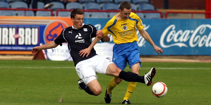 Football, Dundee v Queen of the South.    Craig Forsyth (Dundee) and Paul Burns (QoS).