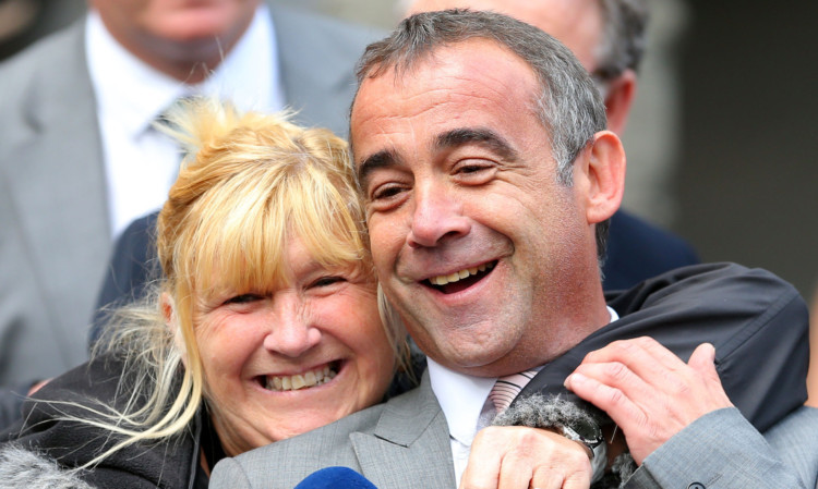 Michael Le Vell is hugged by his sister Sue outside Manchester Crown Court after he was cleared of the charges.