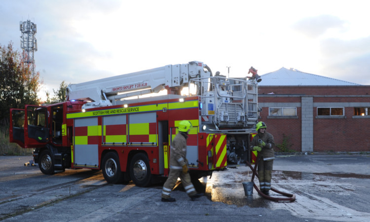 Firefighters at the scene last night.