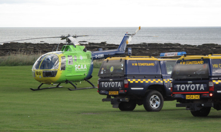 The helicopter ambulance at the scene.