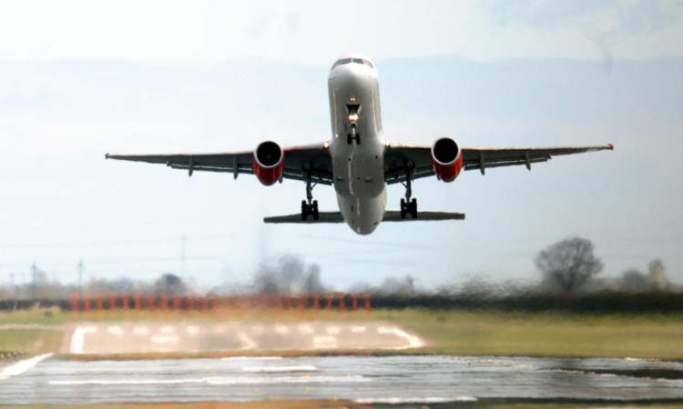 A Jet2.com passenger jet leaves Newcastle Airport en route to Sharm el-Sheikh International Airport in Egypt.