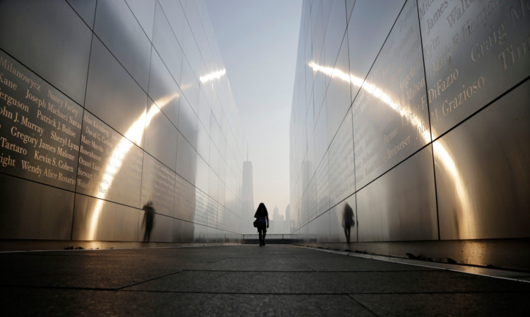 A visitor walks through the Empty Sky memorial to New Jerseys victims of the September 11 2001 attacks in Jersey City.