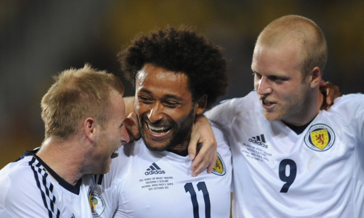 Ikechi Anya (centre) became an instant hit with the Tartan Army thanks to his wonderful performance in Skopje.