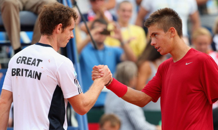 Andy Murray is congratulated by Borna Coric.
