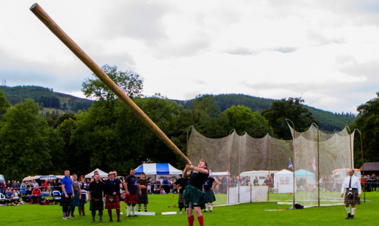Lorne Colthart tossing the caber.