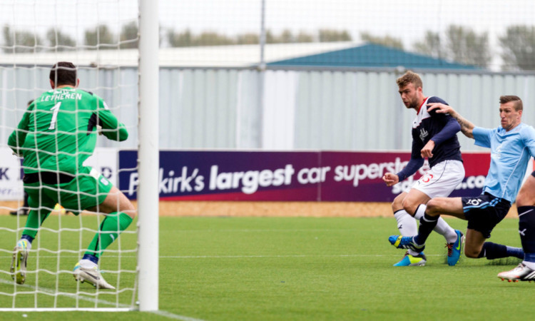 Rory Loy slots the ball home to give Falkirk an early lead.