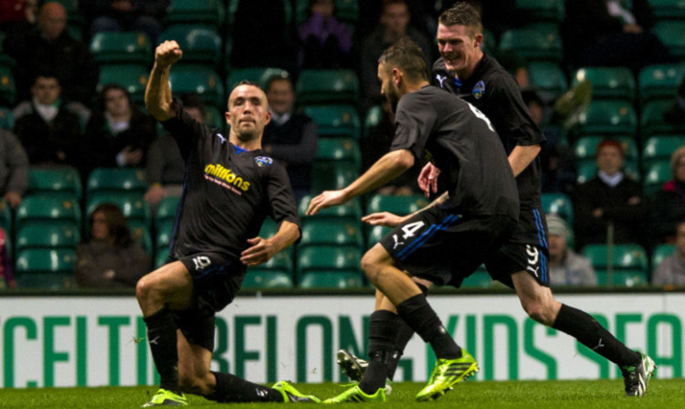 Dougie Imrie (left) celebrates after netting what proved to be the winning goal.