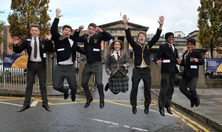 Kim Cessford - 03.11.12 - pictured during the Dundee High School open morning in front of the school gates are pupils l to r - Guy Doogan, Adam Powrie, Cameron McCrimmon, Morven Millar, Chris Acheson, Rifat Uddin and Sadik Chowdhury