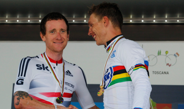 Bradley Wiggins, left, congratulates time-trial champion Tony Martin.