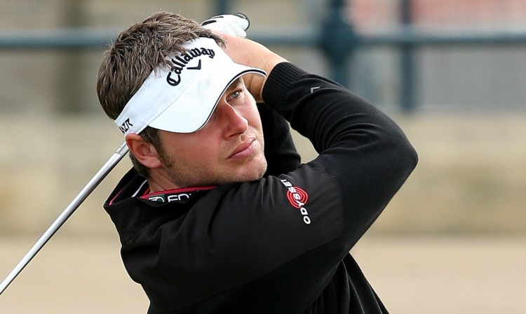 George Murray teeing off at St Andrews.