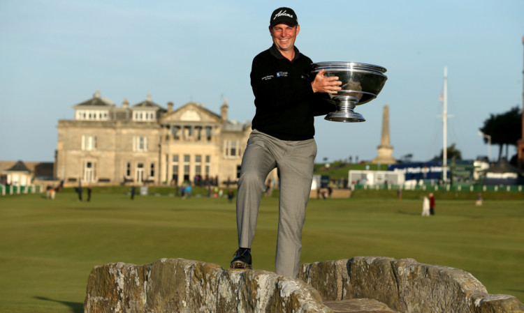 David Howell savours the customary pose of St Andrews champions.