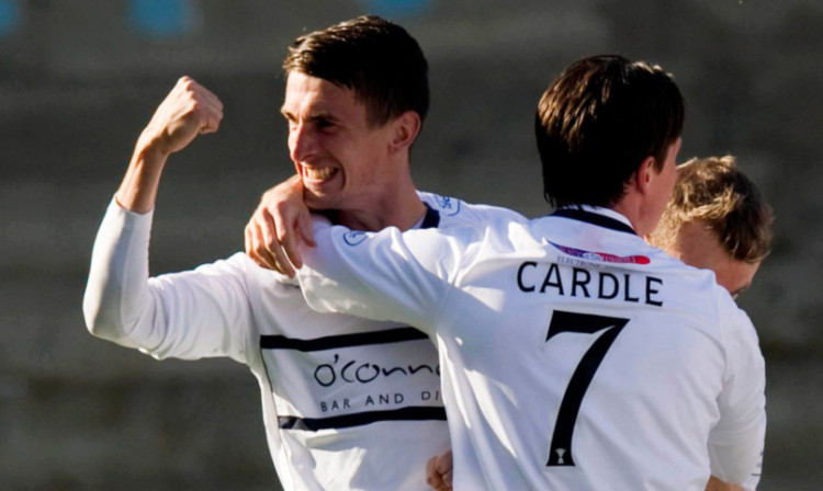 Grant Anderson celebrates scoring for Raith as he is congratulated by Joe Cardle.