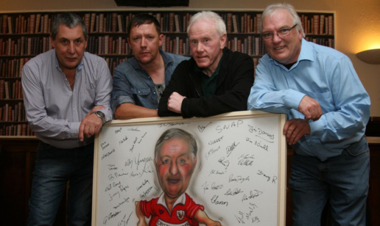 Kinloch Arms mine host Dougie Gilchrist (left) accepts the framed print of Geordie Tosh from his nephews Mark and David Patullo and Alex Ewart.